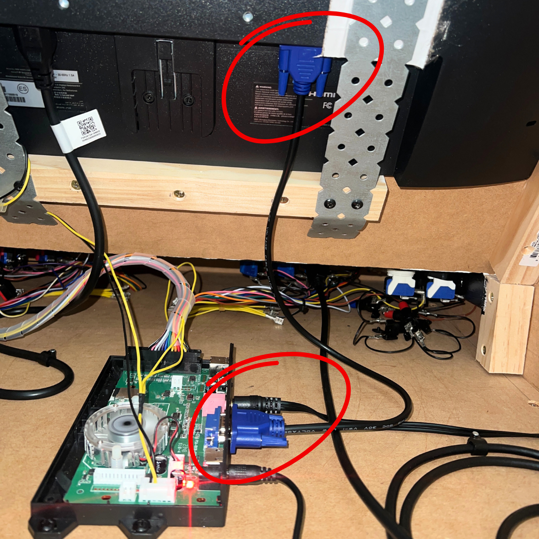 VGA cable installed inside arcade machine connecting to monitor and emulator