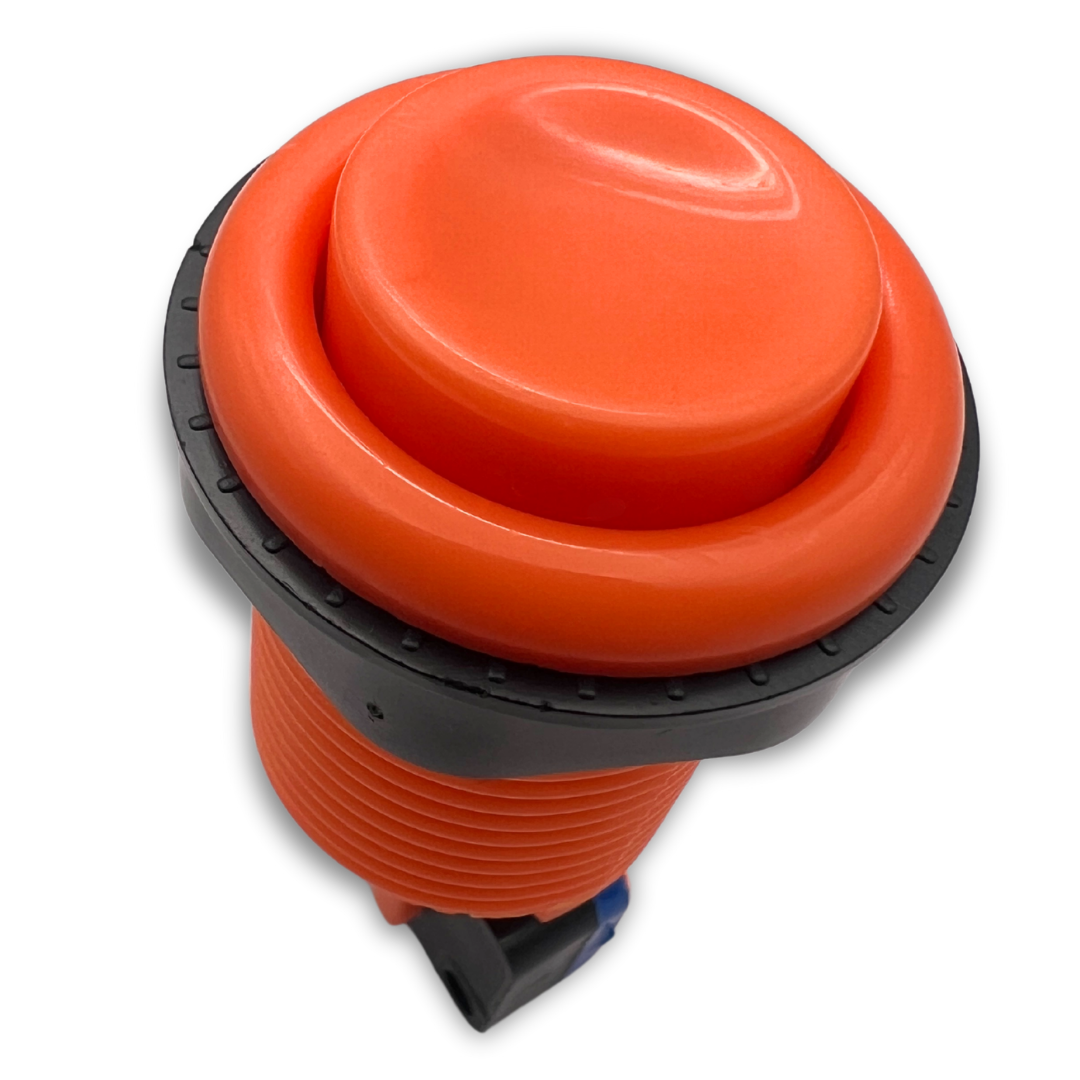 Close-up of orange arcade button with threaded body and black rim