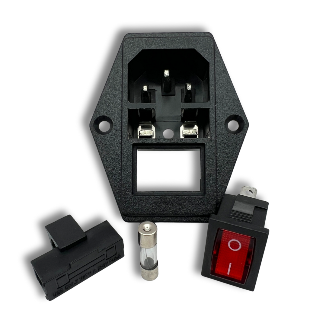Disassembled components of Arcade Revival’s C14 fused switch kit for arcade builds