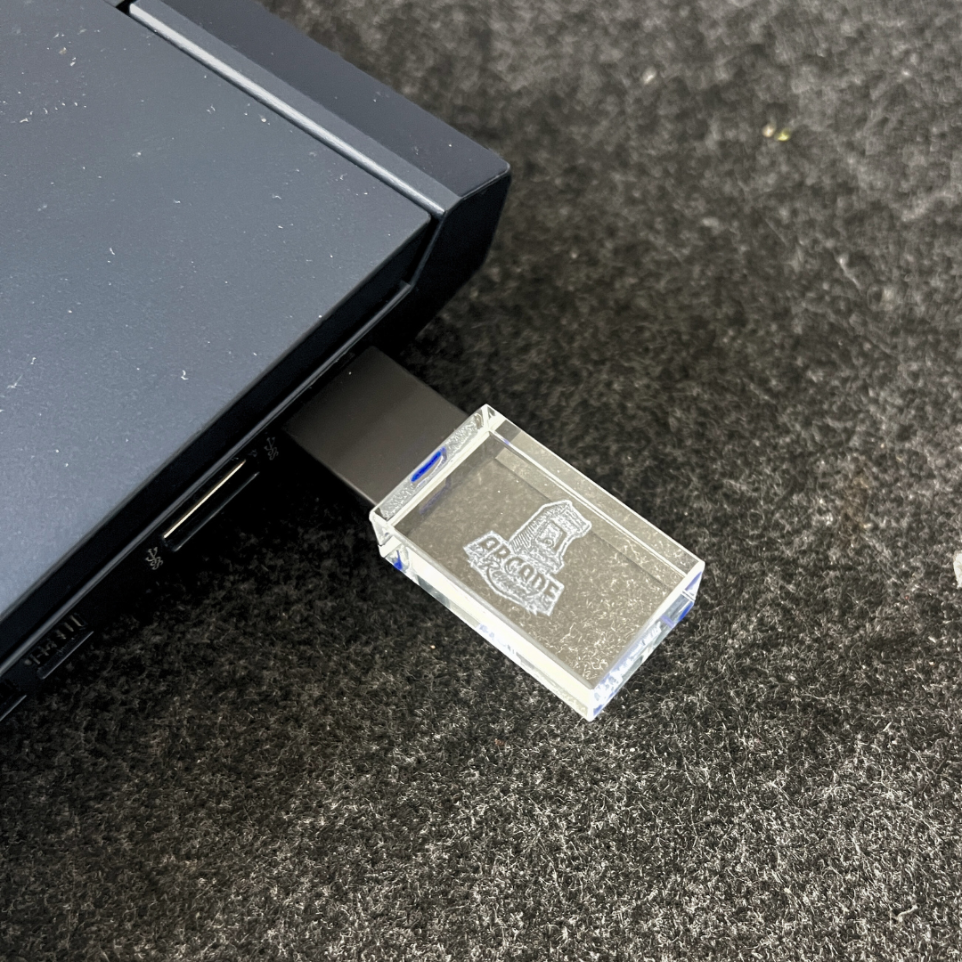 Arcade Revival retro gaming USB drive with clear acrylic logo