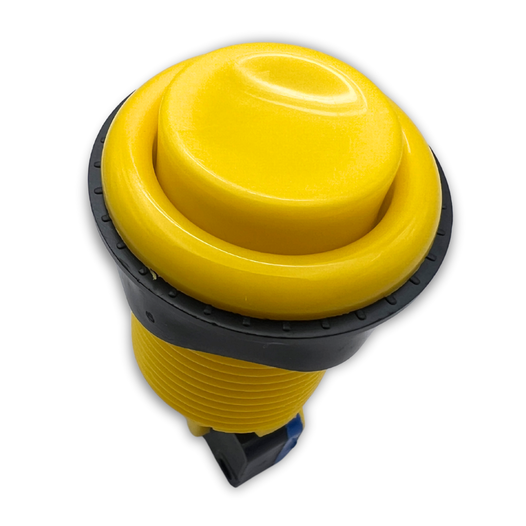 Angled view of yellow arcade button for custom arcade builds