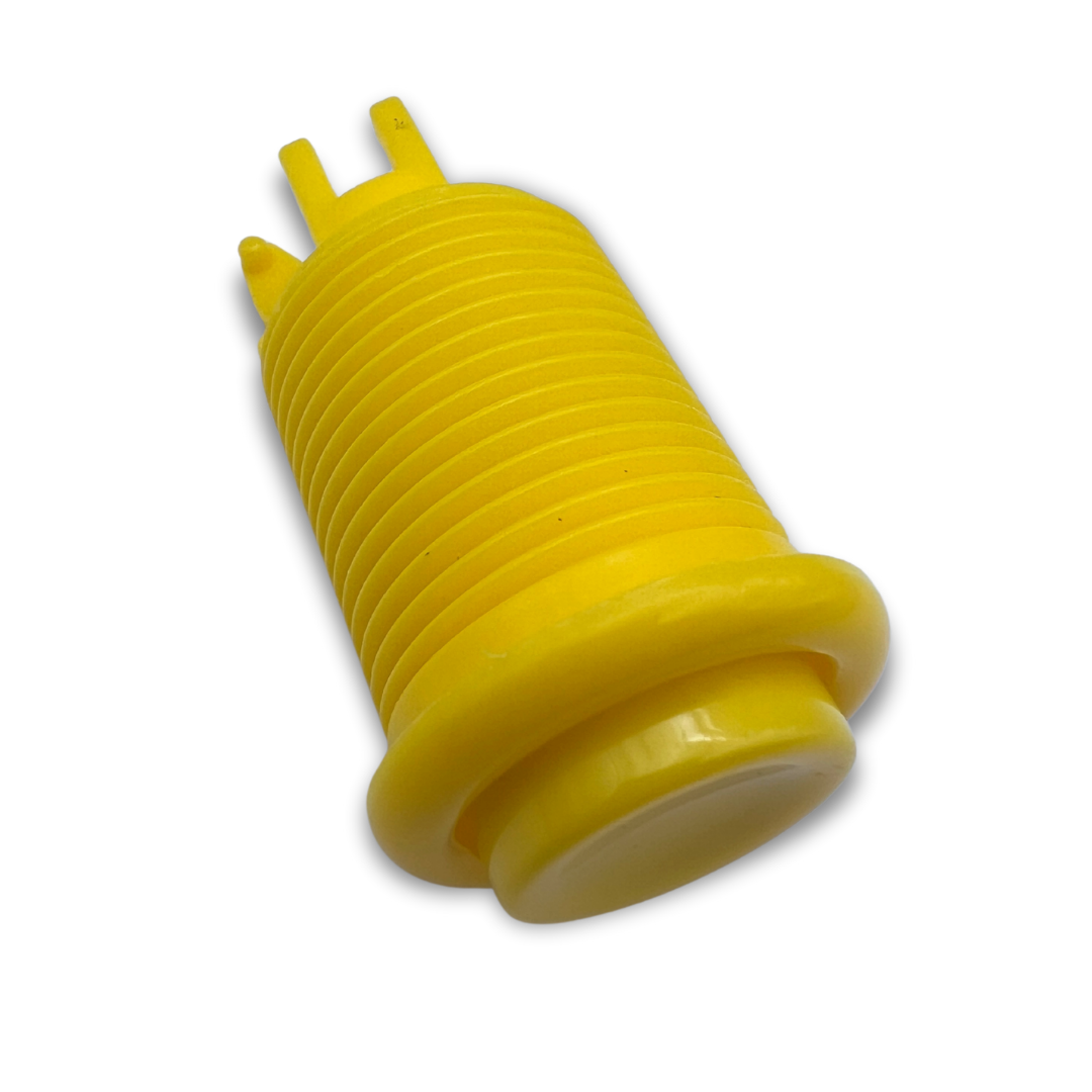 Yellow arcade button shell without micro switch, angled view