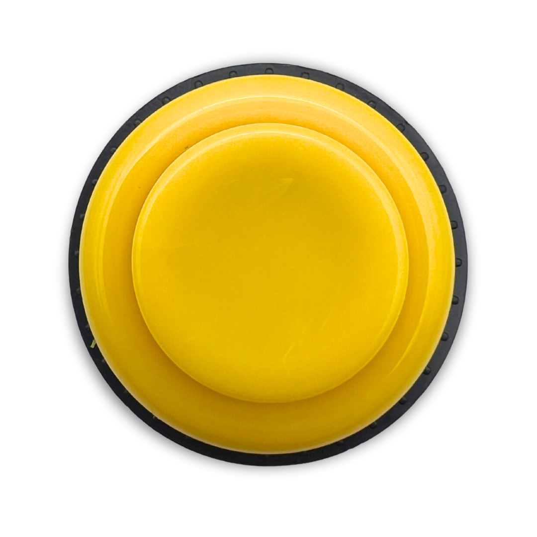 Top view of yellow arcade push button for DIY arcade machines