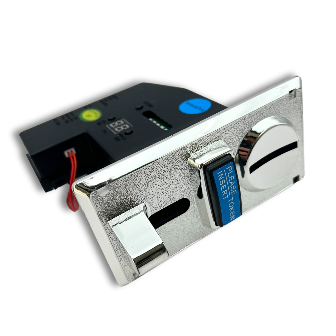 Coin acceptor laying down view of front face plate and wiring mechanism at rear