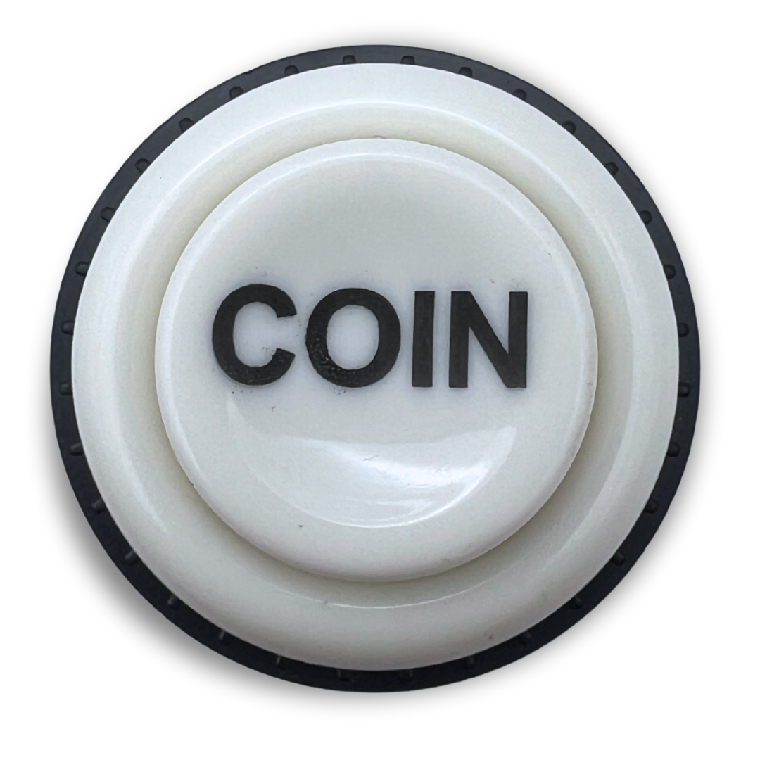 Top view of white arcade cabinet coin button with "COIN" text
