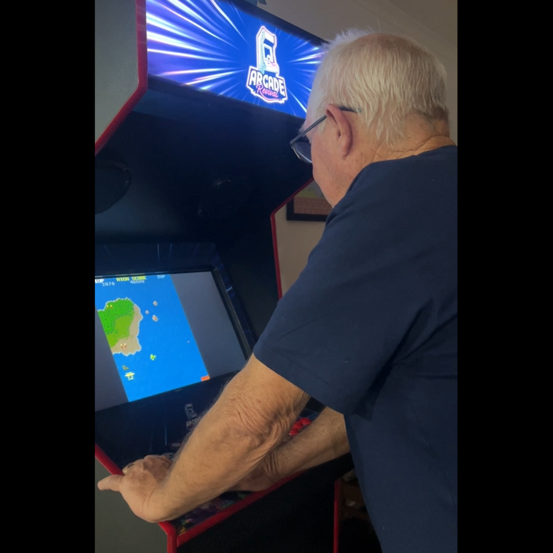 man playing classic arcade game 1942 on custom Arcade Revival machine.