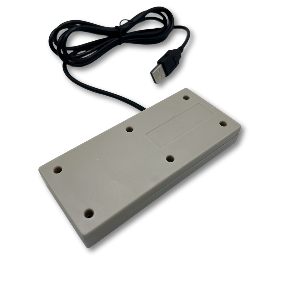 Back view of NES-style USB controller showing cable placement and screw details.