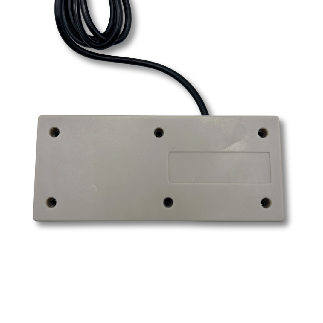 Back panel view of NES-style USB controller showing screw placement, cable connection, and textured casing for retro gaming setups.