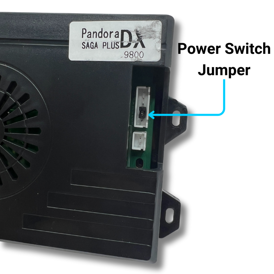 Pandora DX2 9800 arcade unit showing the labeled power switch jumper