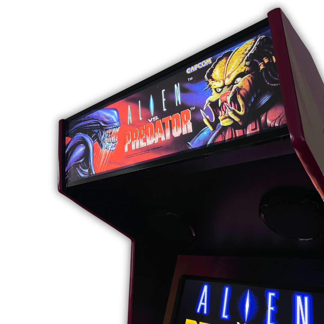 Close up angle view of Alien vs. Predator arcade marquee mounted on a DIY arcade cabinet with Alien vs. Predator gameplay screen visible below.