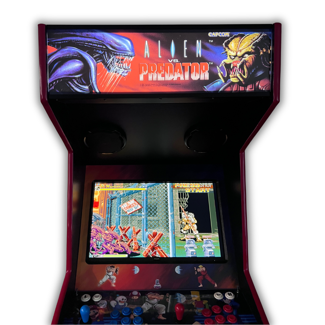 Alien vs. Predator arcade marquee lit up on a DIY arcade cabinet front view with gameplay screen visible below.