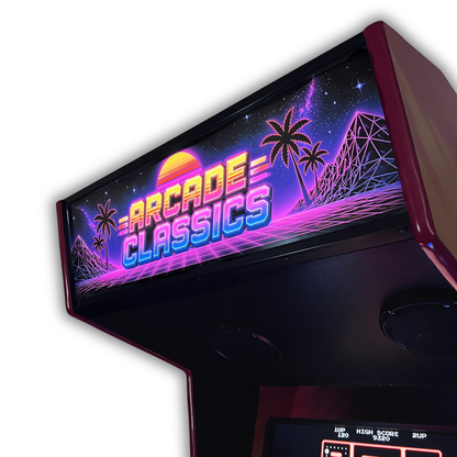 Arcade Classics Neon Horizon arcade marquee close up angle view on a DIY arcade cabinet showing the glowing retro sunset, palm trees and wireframe mountains with the high score screen visible below.