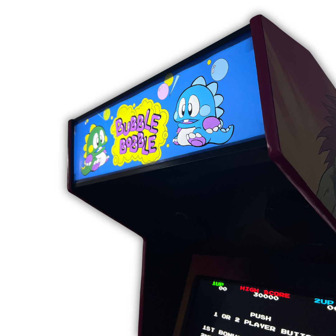 Close up angle view of Bubble Bobble arcade marquee mounted on a DIY arcade cabinet with Bubble Bobble title screen visible below.