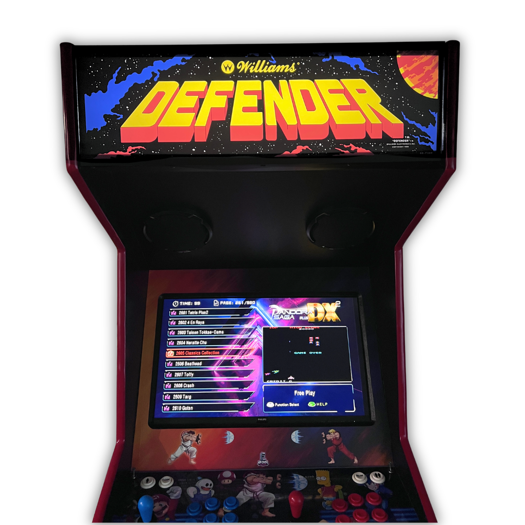 Defender arcade marquee lit up on a DIY arcade cabinet front view with Pandora Saga game selection screen visible below.