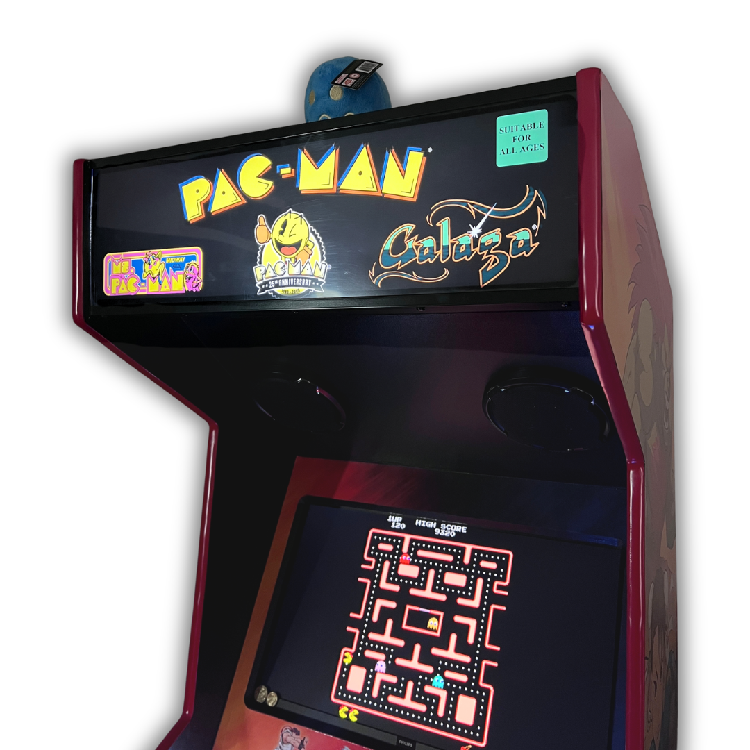 Close up angle view of Pac-Man 25th Anniversary marquee mounted on a DIY arcade cabinet with Ms. Pac-Man gameplay screen visible below.