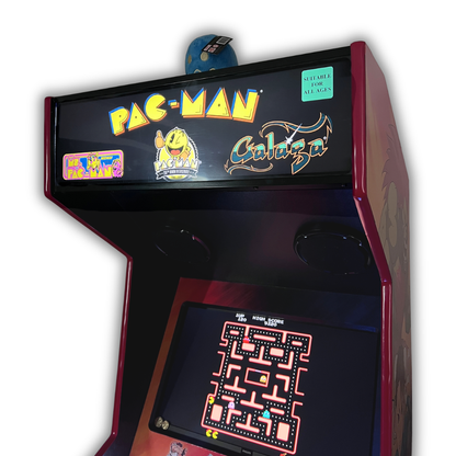 Close up angle view of Pac-Man 25th Anniversary marquee mounted on a DIY arcade cabinet with Ms. Pac-Man gameplay screen visible below.