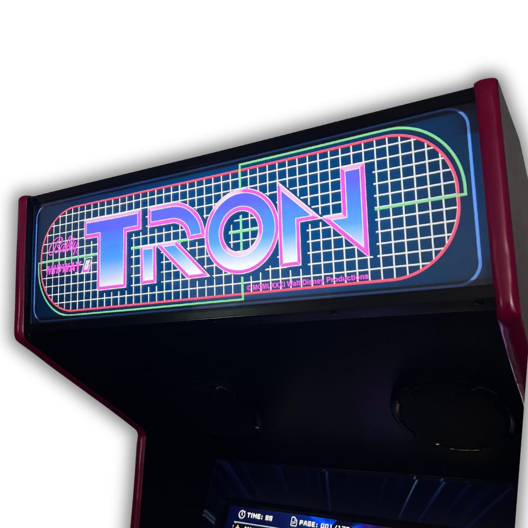 Close-up angled view of TRON arcade marquee reproduction installed on Arcade Revival cabinet with bright neon lighting.