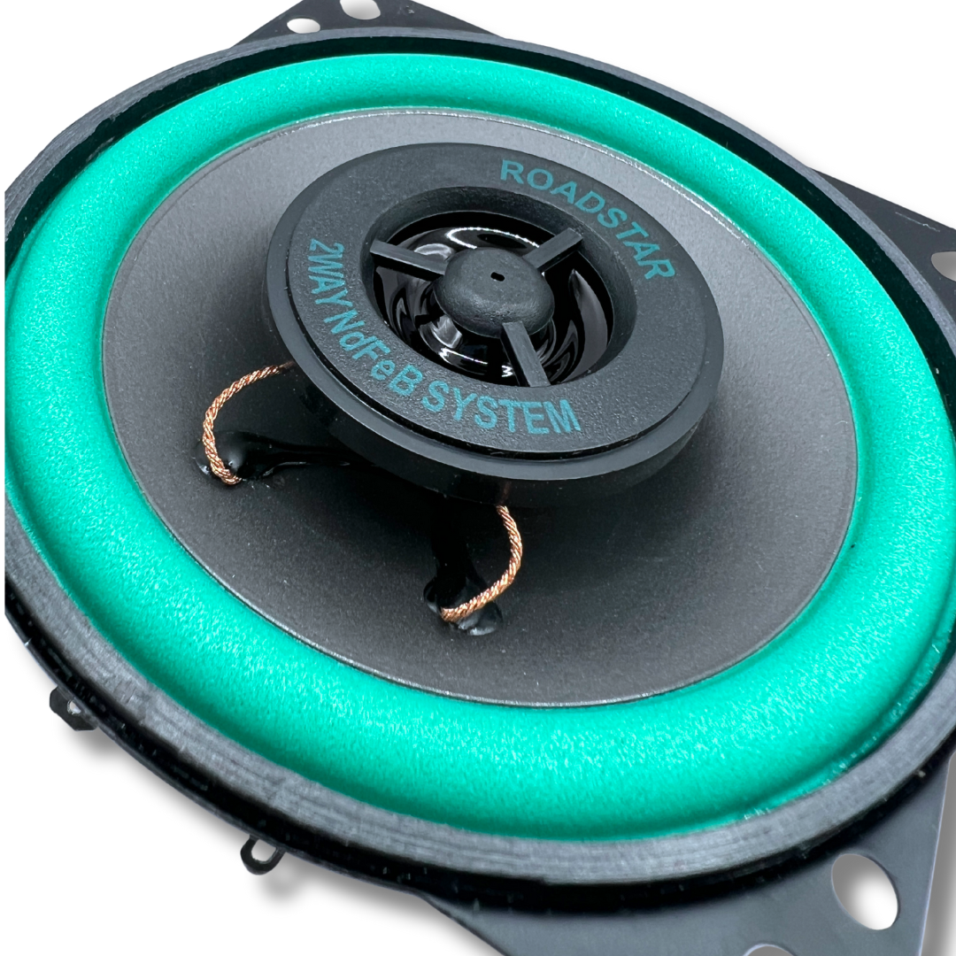 Angled close-up of Roadstar VO-402 4-inch 2-way speaker showing detailed cone and surround