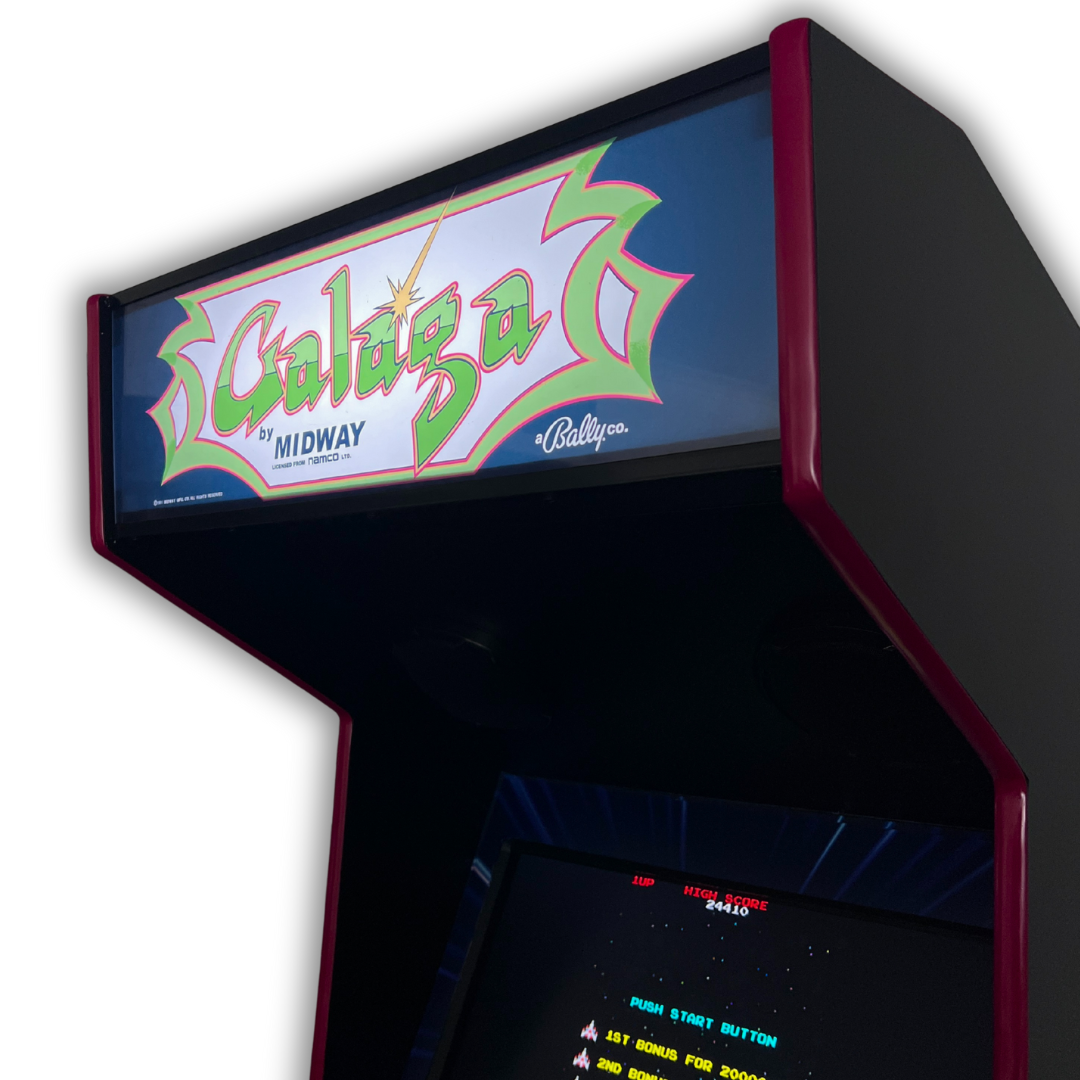 Side angle view of Galaga reproduction light-up marquee installed on arcade cabinet, featuring bright retro Midway artwork.