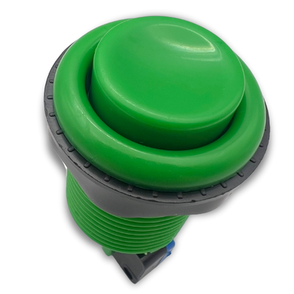 Front angled view of green arcade button with bezel ring