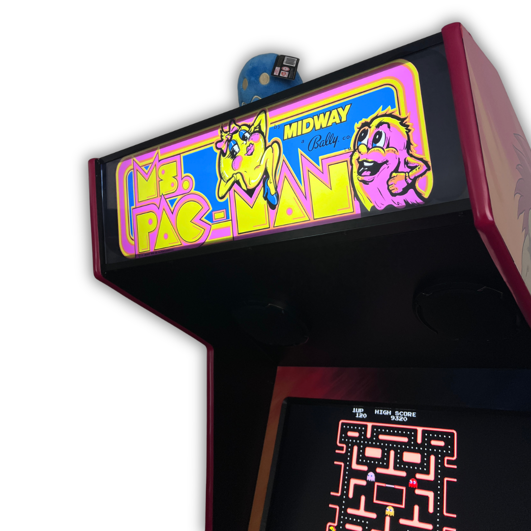 Close up angle view of Ms. Pac-Man arcade marquee mounted on a DIY arcade cabinet with gameplay screen visible below.