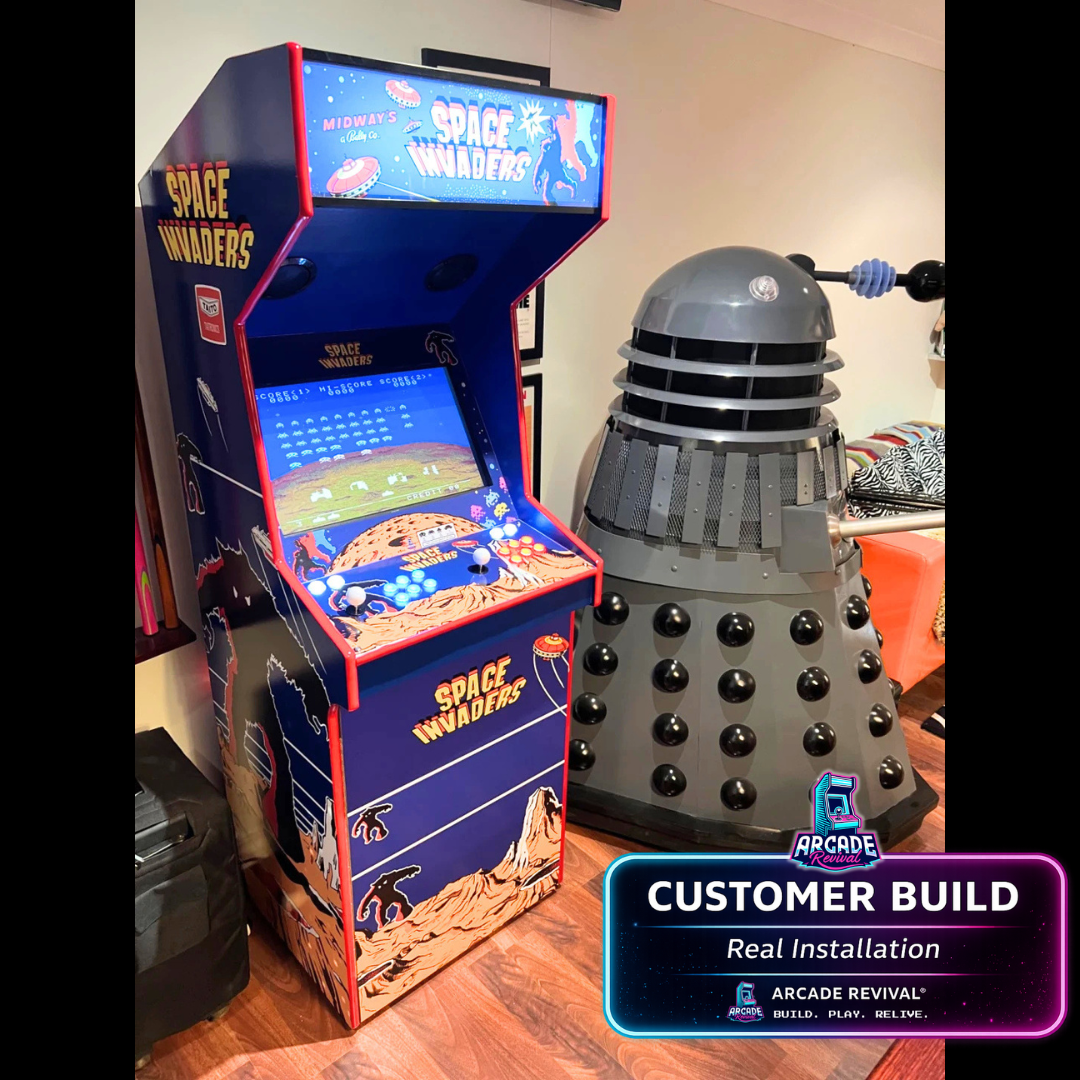 Real installation of Space Invaders arcade cabinet wrap by Arcade Revival showing illuminated marquee, retro artwork and completed DIY arcade machine