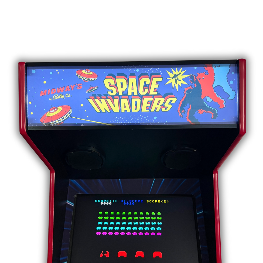 Detailed view of Space Invaders reproduction marquee on full-size cabinet playing classic Space Invaders game.