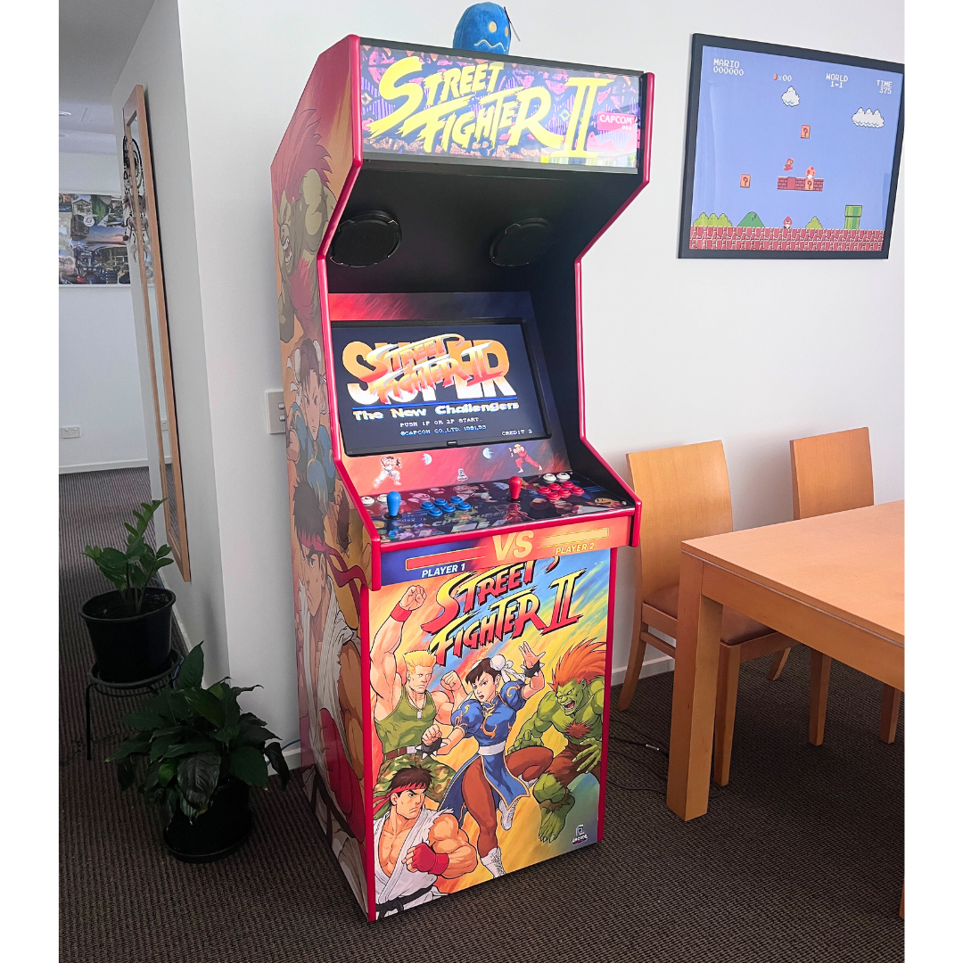 Street Fighter II full arcade cabinet wrap installed on an Arcade Revival upright cabinet showing front panels, marquee and control panel