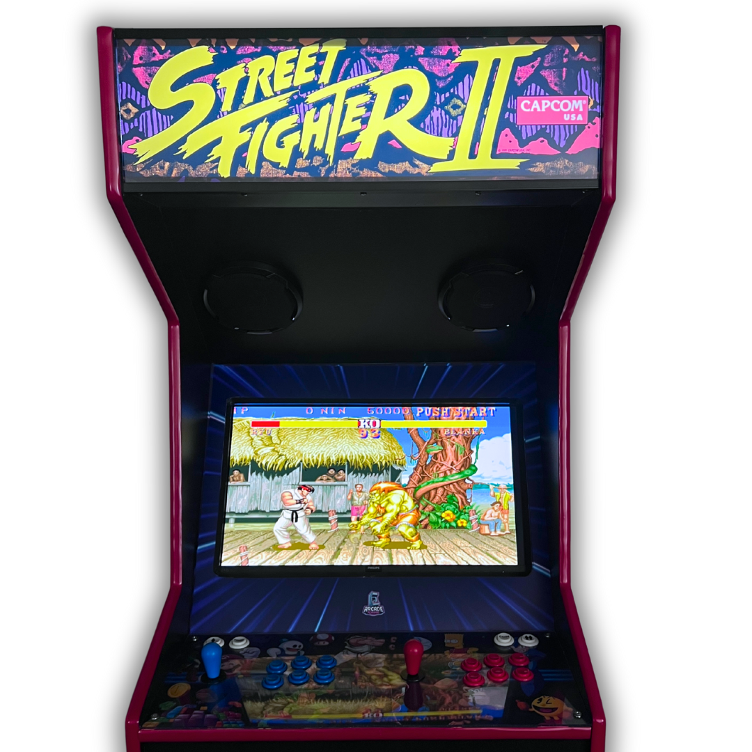 Street Fighter II arcade cabinet with reproduction marquee and gameplay screen showing Ryu vs Blanka fight scene.