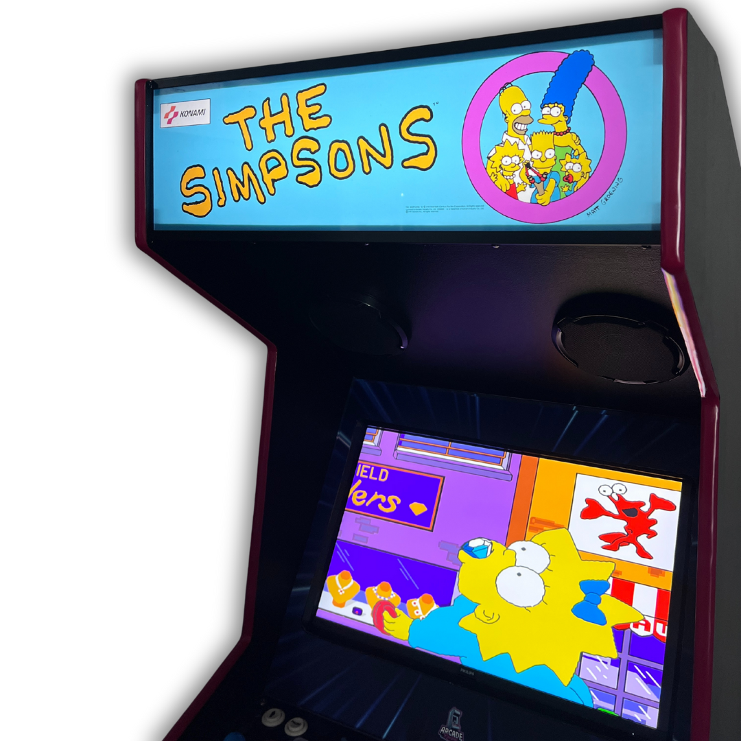 Angled close-up of The Simpsons arcade marquee reproduction glowing when backlit on cabinet