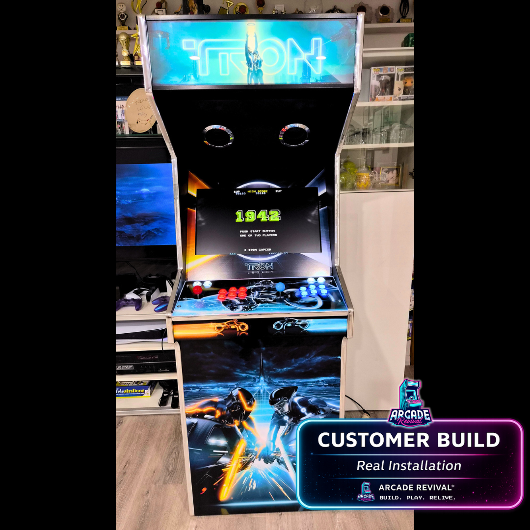 Real installation of TRON Legacy arcade cabinet wrap by Arcade Revival showing illuminated marquee, front artwork and completed DIY arcade machine