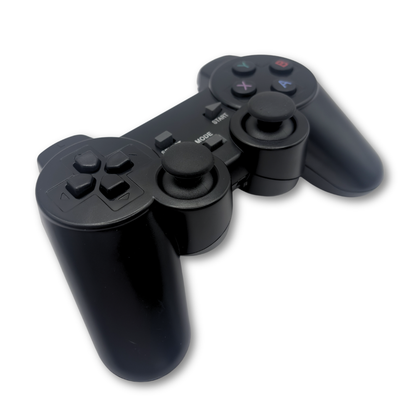 Black wireless PS gamepad controller top-down angled view
